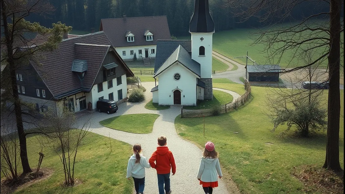 Blick auf die Pfarre St. Andrä mit Kindern auf dem Kreuzweg